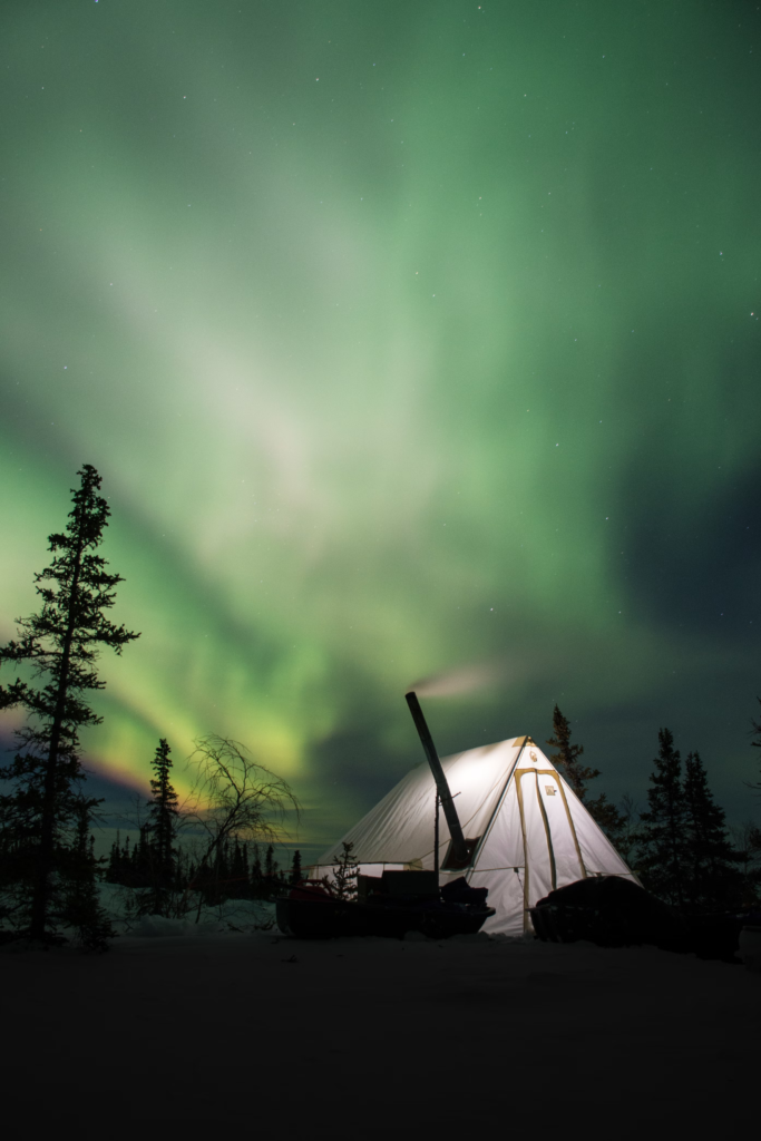 Camping Under the Northern Lights: "Tent under Northern Lights in Norway - Unforgettable Travel Adventures"